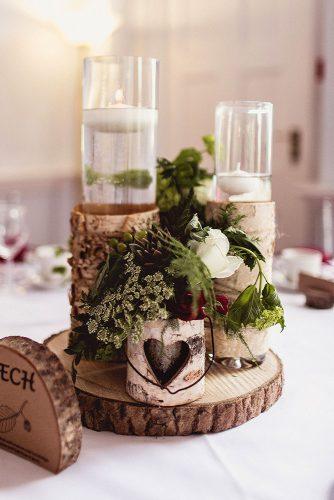 rustic wedding ideas wooden stands with candles and carved hearts anna clarke photography