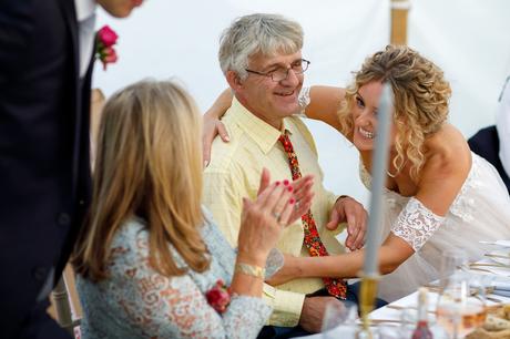 Summer Solstice Wedding – Polly and Steve the bride hugs her father
