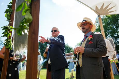 Summer Solstice Wedding – Polly and Steve checking out the table plan