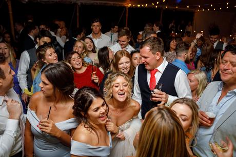 Summer Solstice Wedding – Polly and Steve bride and groom on the dancefloor