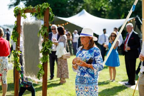 Summer Solstice Wedding – Polly and Steve checking out the wedding table plan