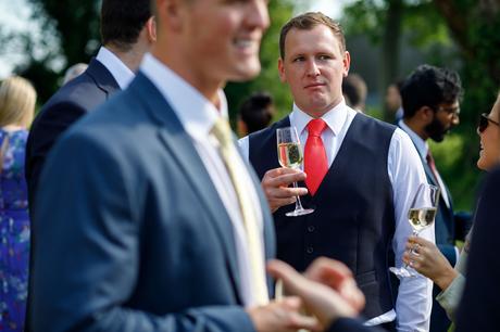 Summer Solstice Wedding – Polly and Steve the groom ponders
