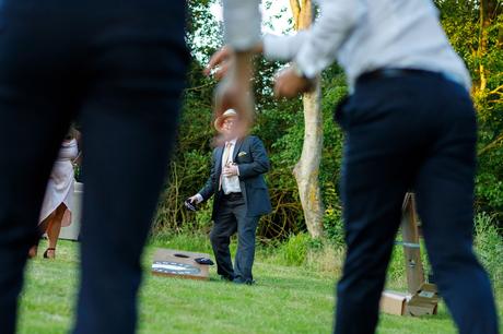 Summer Solstice Wedding – Polly and Steve guests playing outside
