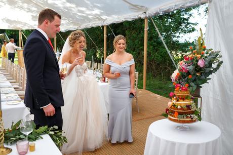 Summer Solstice Wedding – Polly and Steve polly and steve check their wedding cake