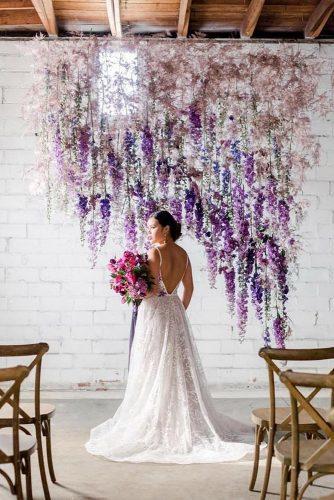 wedding ideas elegant hanging lilac flowers bridal altar katepeasephotography