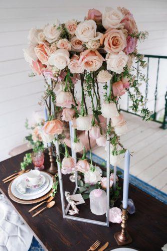 wedding ideas tall centerpiece with hanging pink roses london light photography
