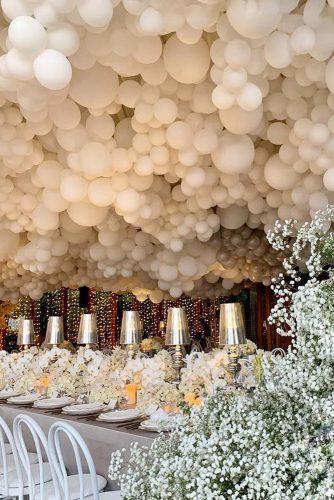wedding ideas indoor ceremony reception decorated with white balloons gideonhermosa