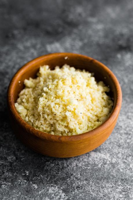 Parmesan Cauliflower Rice in wooden bowl