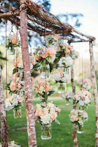 shabby chic vintage wedding decor ideas wooden arch decorated with suspended flower jars rebecca arthurs photography