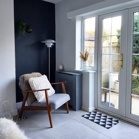 A gray armchair in a Scandinavian style living room.