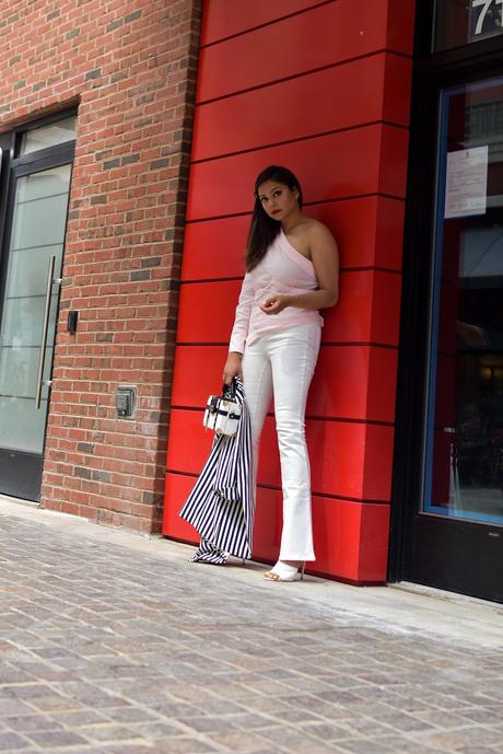 white jeans outfit, flared jeans, one shoulder blouse, white mules, stripe jacket, boxed clutch, fashion, style, street style, myriad musings 