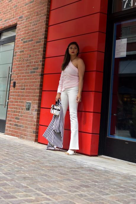 white jeans outfit, flared jeans, one shoulder blouse, white mules, stripe jacket, boxed clutch, fashion, style, street style, myriad musings 