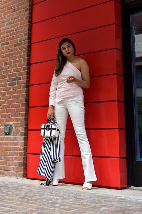 white jeans outfit, flared jeans, one shoulder blouse, white mules, stripe jacket, boxed clutch, fashion, style, street style, myriad musings 