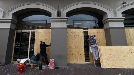 Barry crawls ashore in Louisiana, weakens to tropical storm