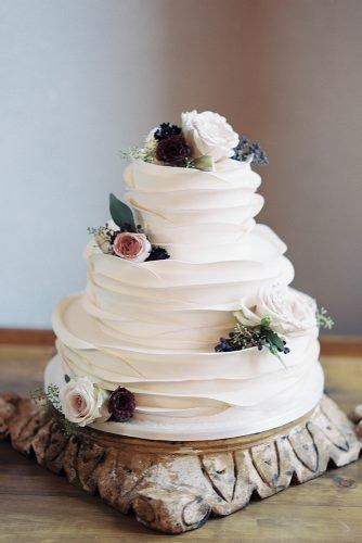 wedding cake ideas photos gallery clean and bare white cake with ruffles and flowers charity maurer photography