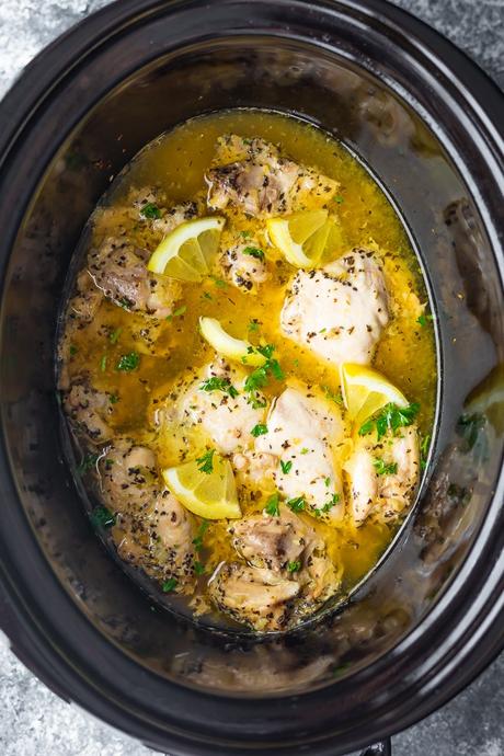 overhead view of slow cooker lemon garlic chicken in slow cooker