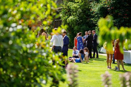 wedding guests on the lawn at pembroke college