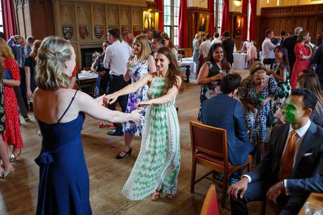 guests dance at a cambridge college wedding