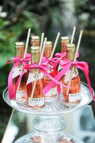 mini champagne bottles decor with ribbons