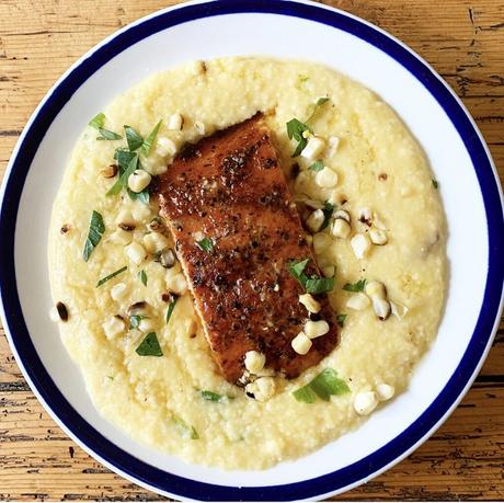 Cedar Bay Grilled Salmon over Gouda Cheese Grits with Charred Summer Corn & Brown Butter