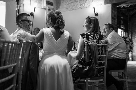 the bride talking to her guests