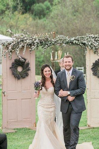 wedding arch whitewashed door with flowers
