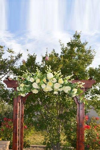 wedding arch wooden wedding arch roses greenery