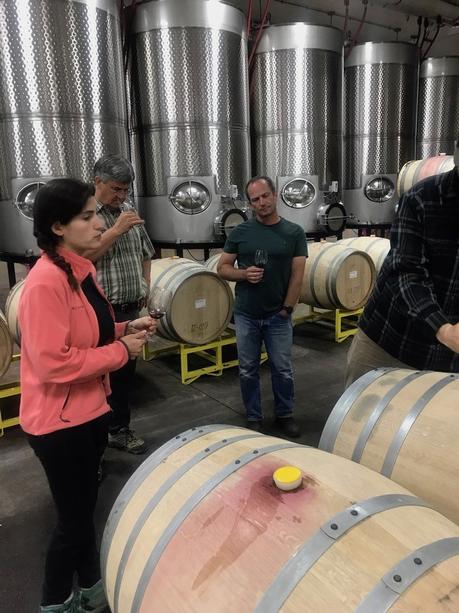 Iris Vineyards winemaking team tastes through base wine samples at their winery in Eugene, Oregon.