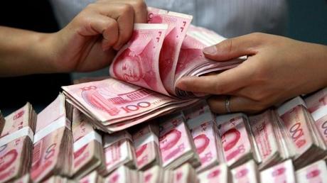 China lets currency sink to 11-year low after Trump threats