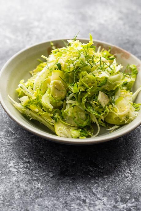 brussel sprout slaw in gray bowl