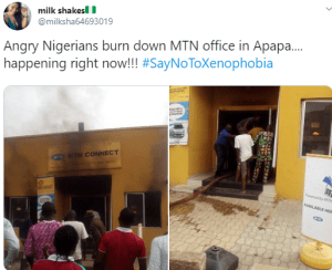 Xenophobic Attack: Angry Nigerians set MTN office on fire in Lagos (Photos)