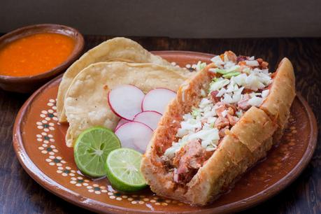 Tortas - A bun stuffed with meat and vegetables and topped with shredded cabbage, cheese, and sour cream. - makes it to our Top 10 food destinations