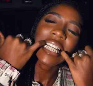 Check Out Tiwa Savage’s Customised Set Of Teeth (Photo)