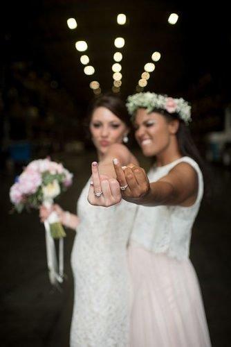 lesbian wedding ideas brides show off their wedding rings
