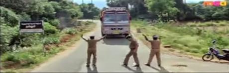 'smuggled truck' - Singam scene ..... burglary in place guarded by German shepherds