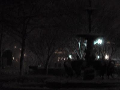 Fountain in the dark with snow [then blue silk]