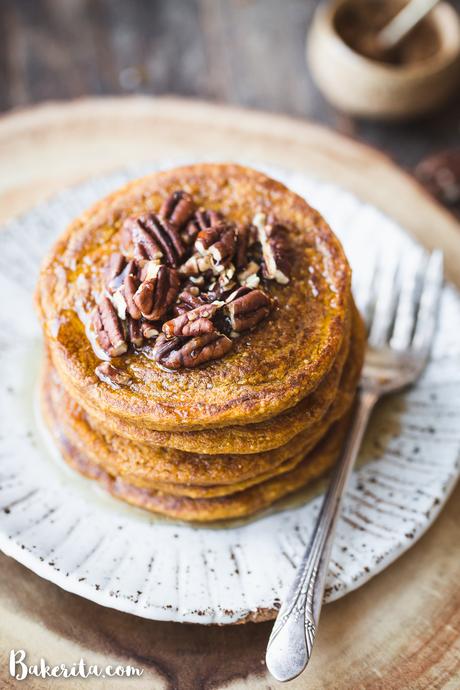 These Gluten-Free Vegan Pumpkin Pancakes tastes like fall thanks to the warm pumpkin spices and maple syrup! They're easy-to-make, light, fluffy, and absolutely delicious. 