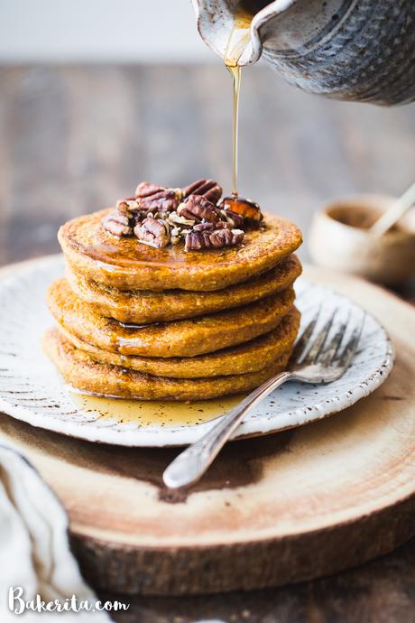 These Gluten-Free Vegan Pumpkin Pancakes tastes like fall thanks to the warm pumpkin spices and maple syrup! They're easy-to-make, light, fluffy, and absolutely delicious. 