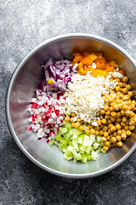 overhead view of bowl with ingredients for the chickpea salad