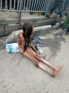 Tattooed Unclad Lady Thrown Out Of A Moving Car (See Photos)