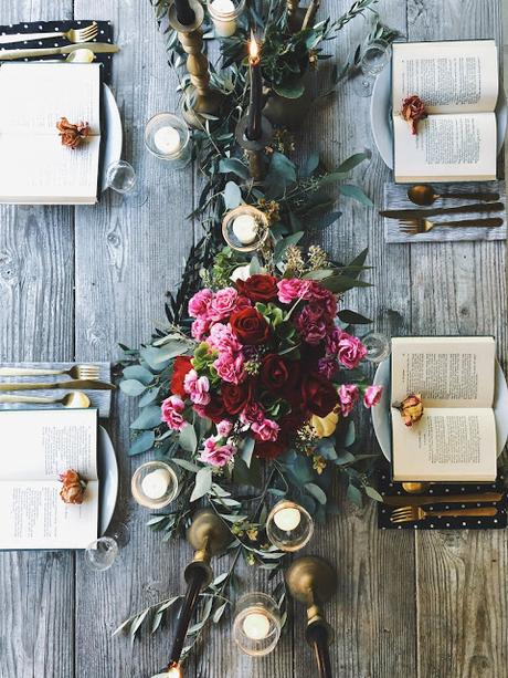 a Halloween tablescape with a mystery book theme a Halloween tablescape with a mystery book theme
