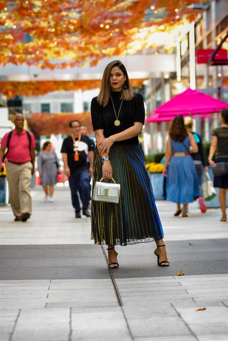 festive outfit, pleated midi skirt, metallic midi skirt outfit, metallic sparkly kate spade sweater, party sweater, black strappy sandals, party outfit, fall fashion, street style, myriad musing, saumya shiohare 
