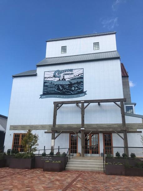 Exterior wooden frames and hand-painted mural by Anthony Kuenzi of Kuenzi Design for Flaneur Wines at the Carlton Grain Elevator. ©LMArcher