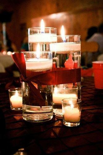 christmas wedding ideas candles with red bow