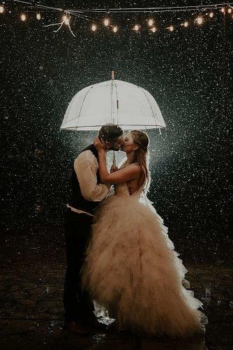 slow dance songs bride and groom kissing under the rain