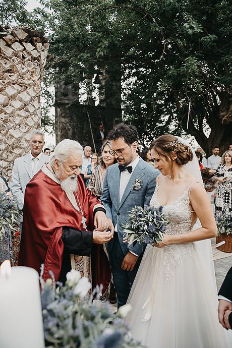 Romantic wedding in Corfu with lavender and olive branches