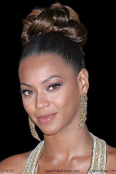 Beyonce modeling an updo that is simply elegant.