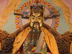 Chinese Buddha statue inside the City God Temple at Dangaer