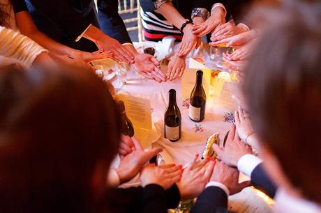 100 Best Barn Wedding Photos guests form a ring with their hands