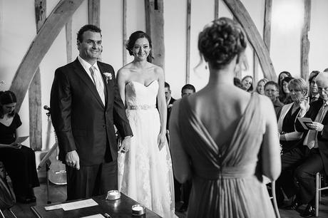 100 Best Barn Wedding Photos a guest reading during a bruisyard hall wedding